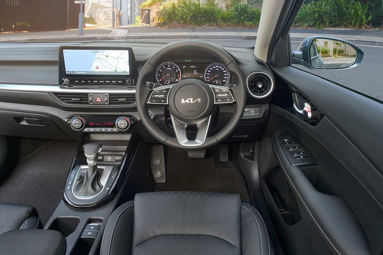 The thoughtful touches include plenty of small item storage space and cupholders (Sport+ sedan pictured).