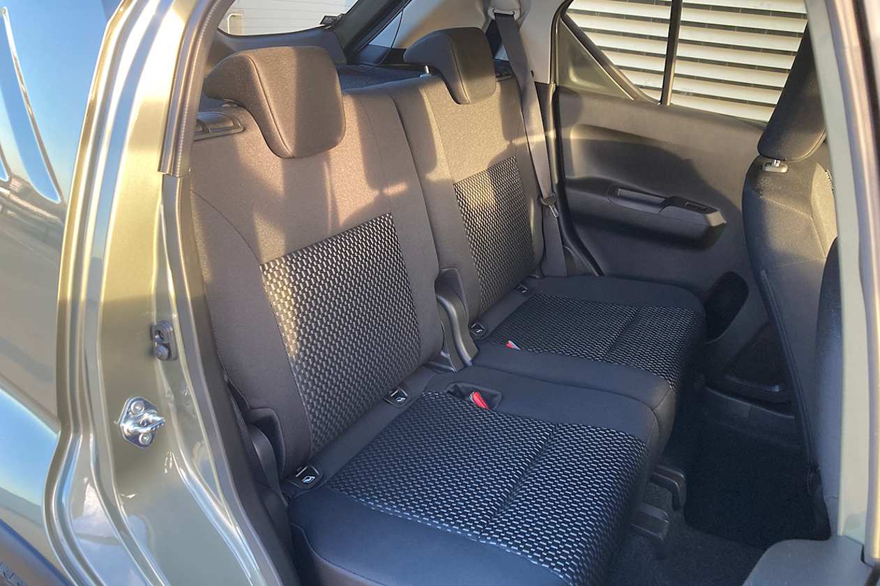 Only two people can sit in the back.