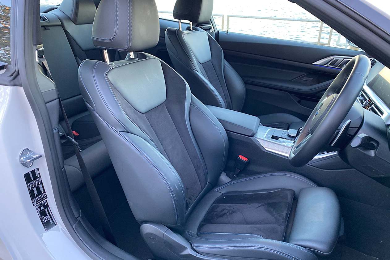 The 420i has synthetic leather and Alcantara interior.