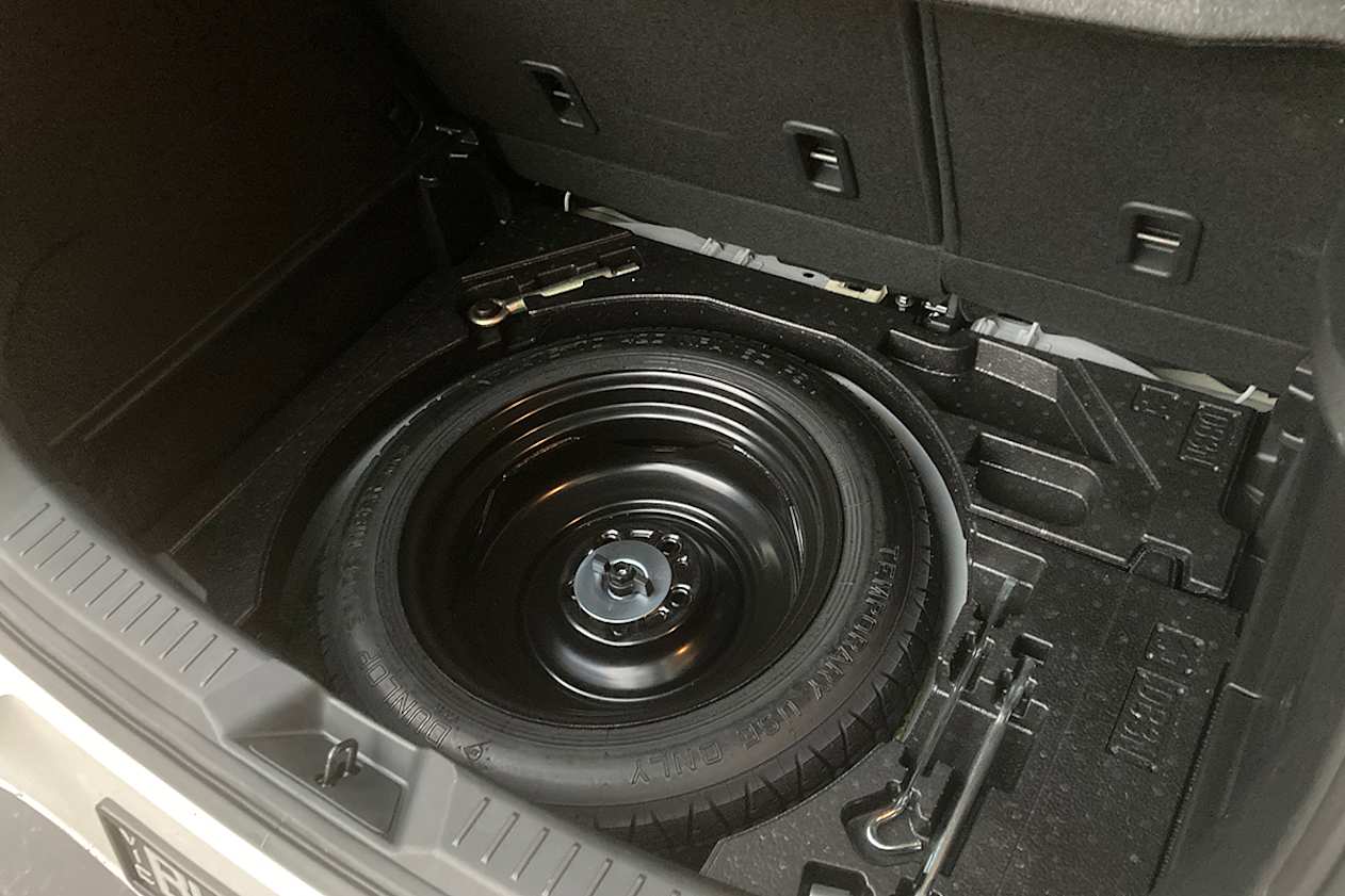 Underneath the boot floor is a space-saver spare wheel.