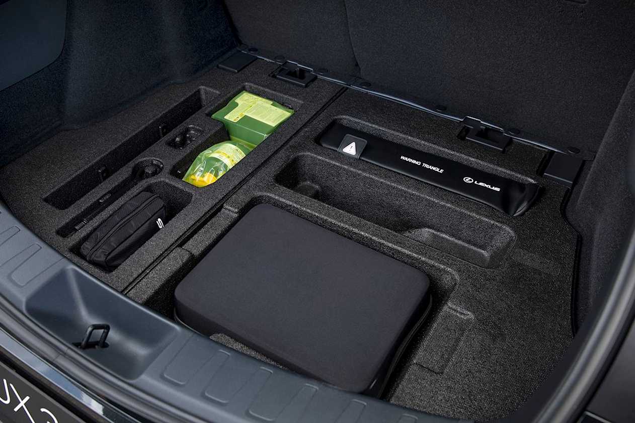 The boot has a solid cargo capacity of 414L (pictured: UX 300e Luxury).