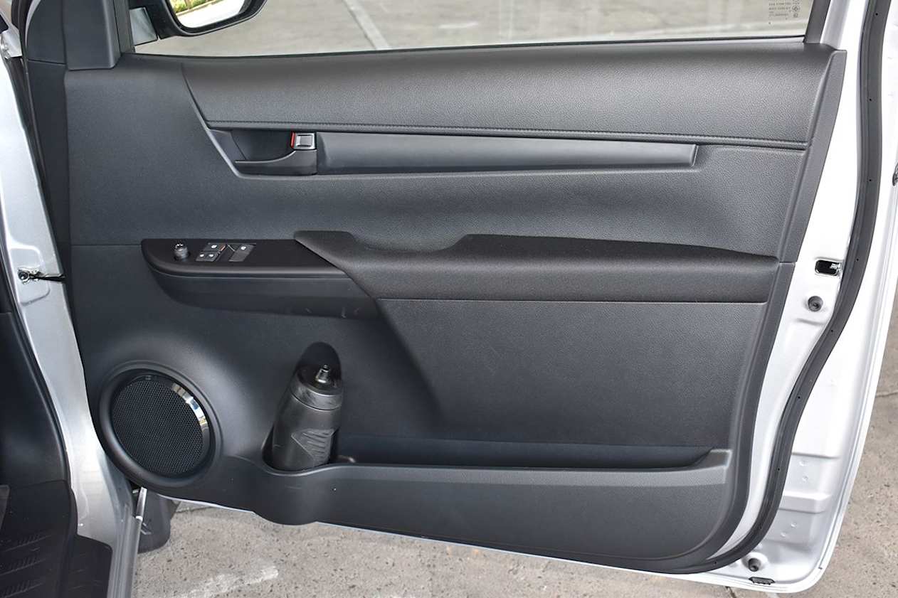  Featuring a large-bottle holder and storage bin in each door. 