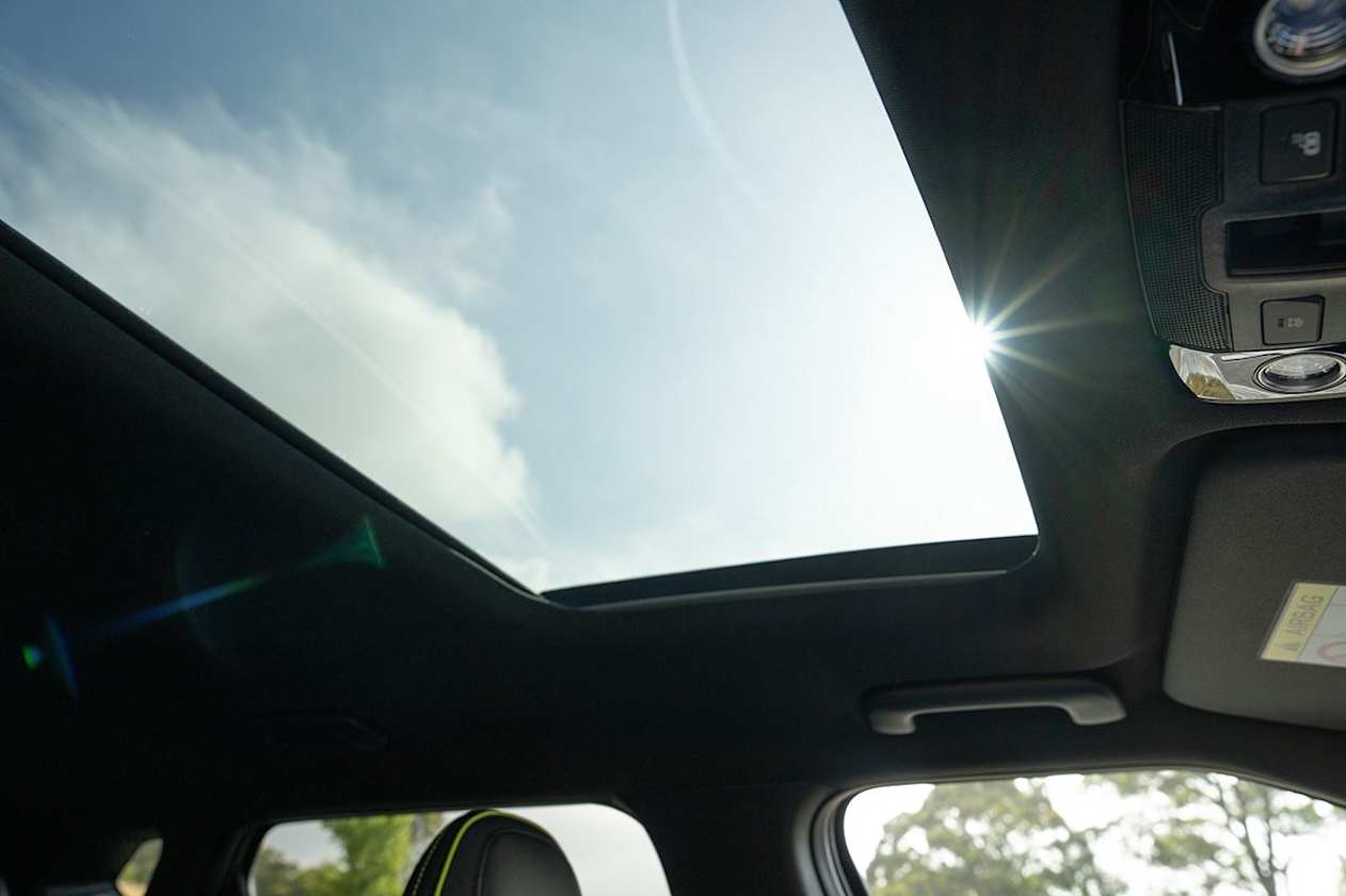 The sunroof gobbles up precious headroom.