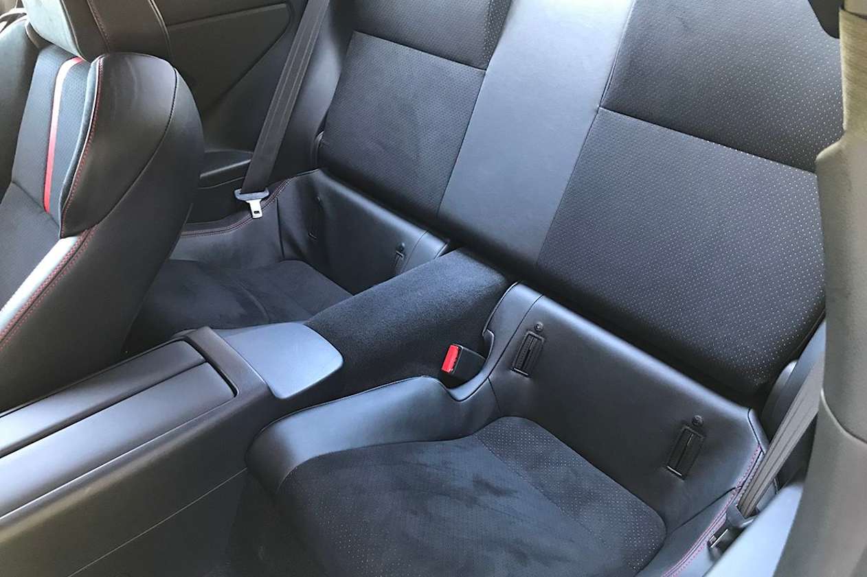 There is nowhere near enough room for two adults to sit comfortably in the rear seats. (Image: James Cleary)