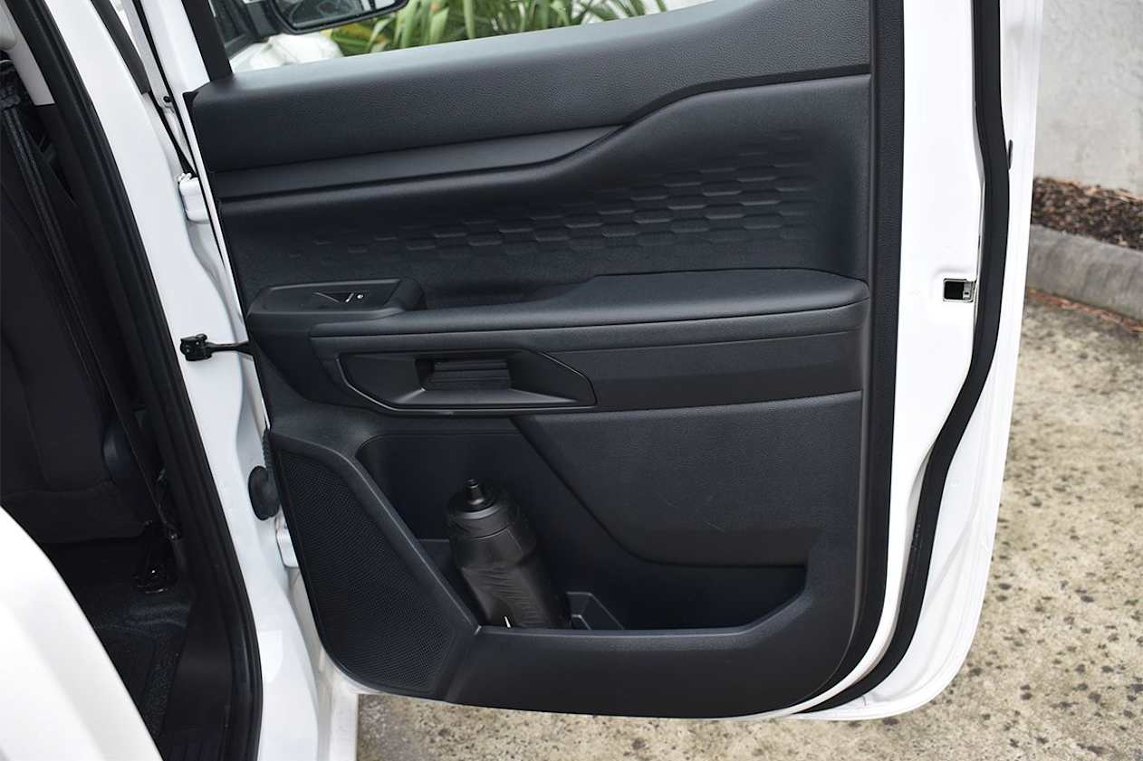 Rear seat passengers get a bottle holder and bin in each door. (Image: Mark Oastler)