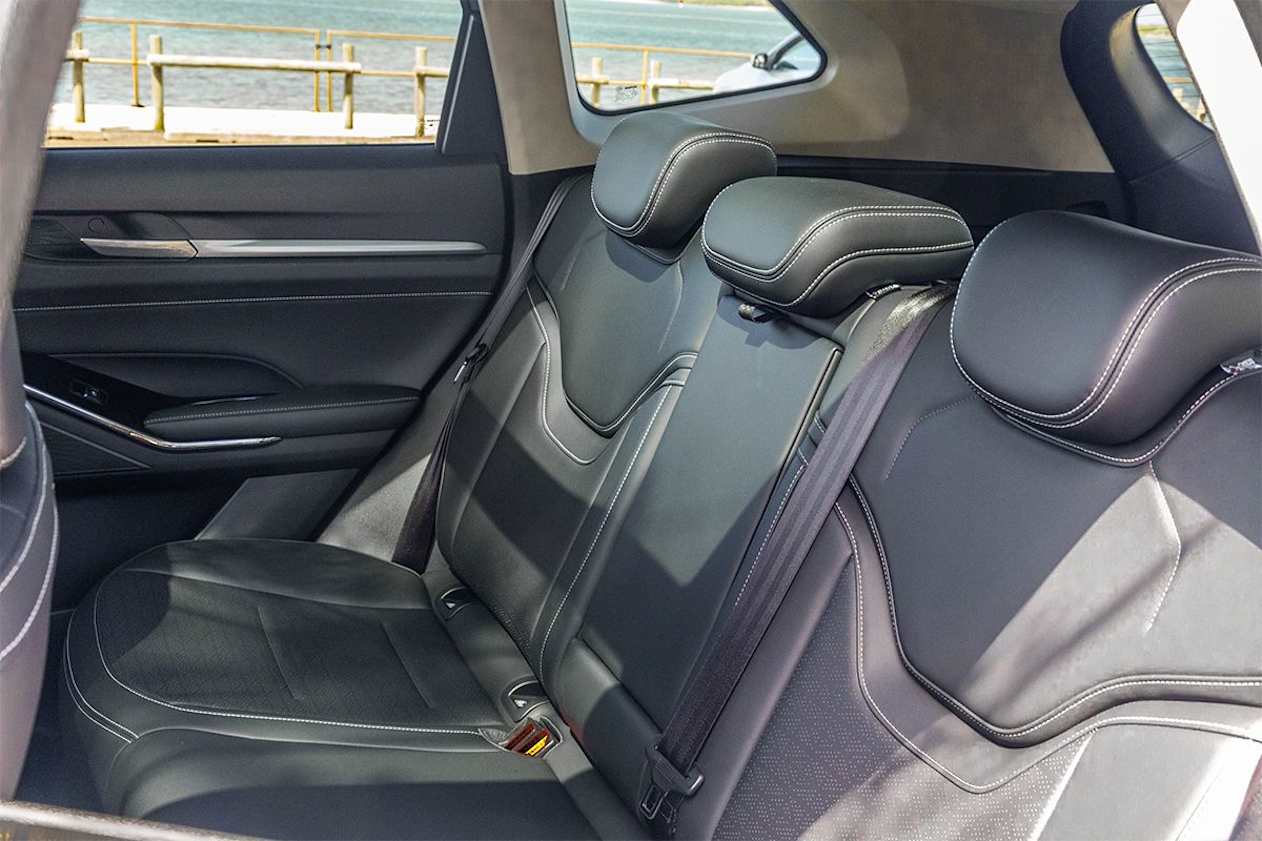 The other amenities in the back row are okay and you get directional air vents and reading lights. (Image: Glen Sullivan)