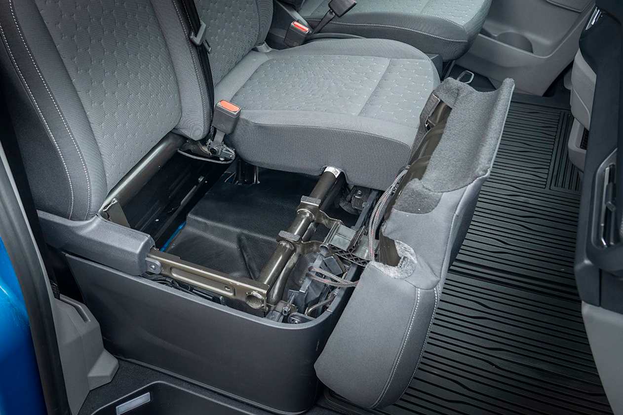 The latter both hinge forward to reveal a massive storage cavity.