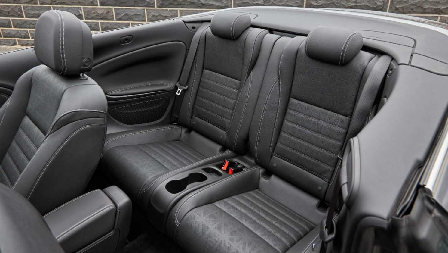 Featuring sweeping lines enhanced by the exposed stitching.