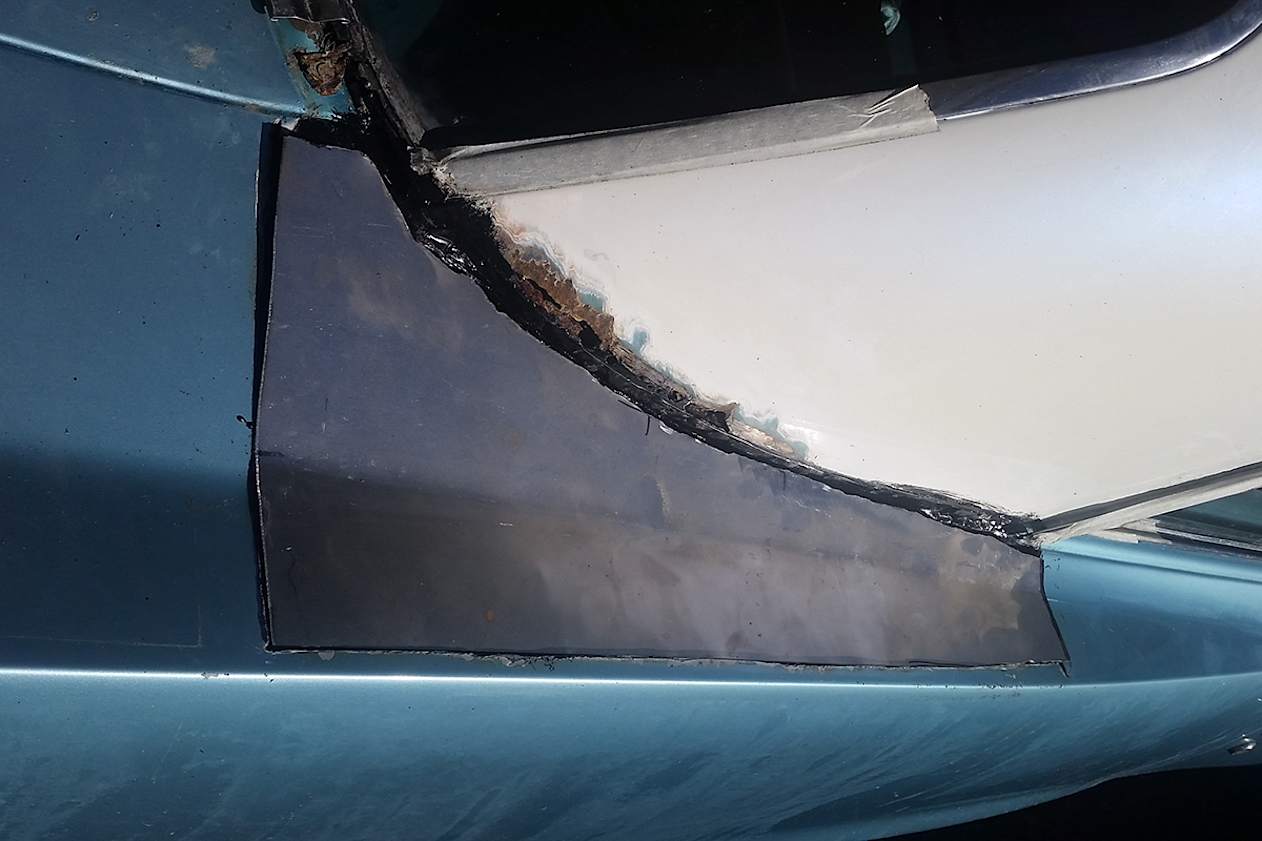 Without proper body-working tools it took me a few goes to bend it far enough on a workbench to fit the car nicely. (image credit: Iain Kelly)