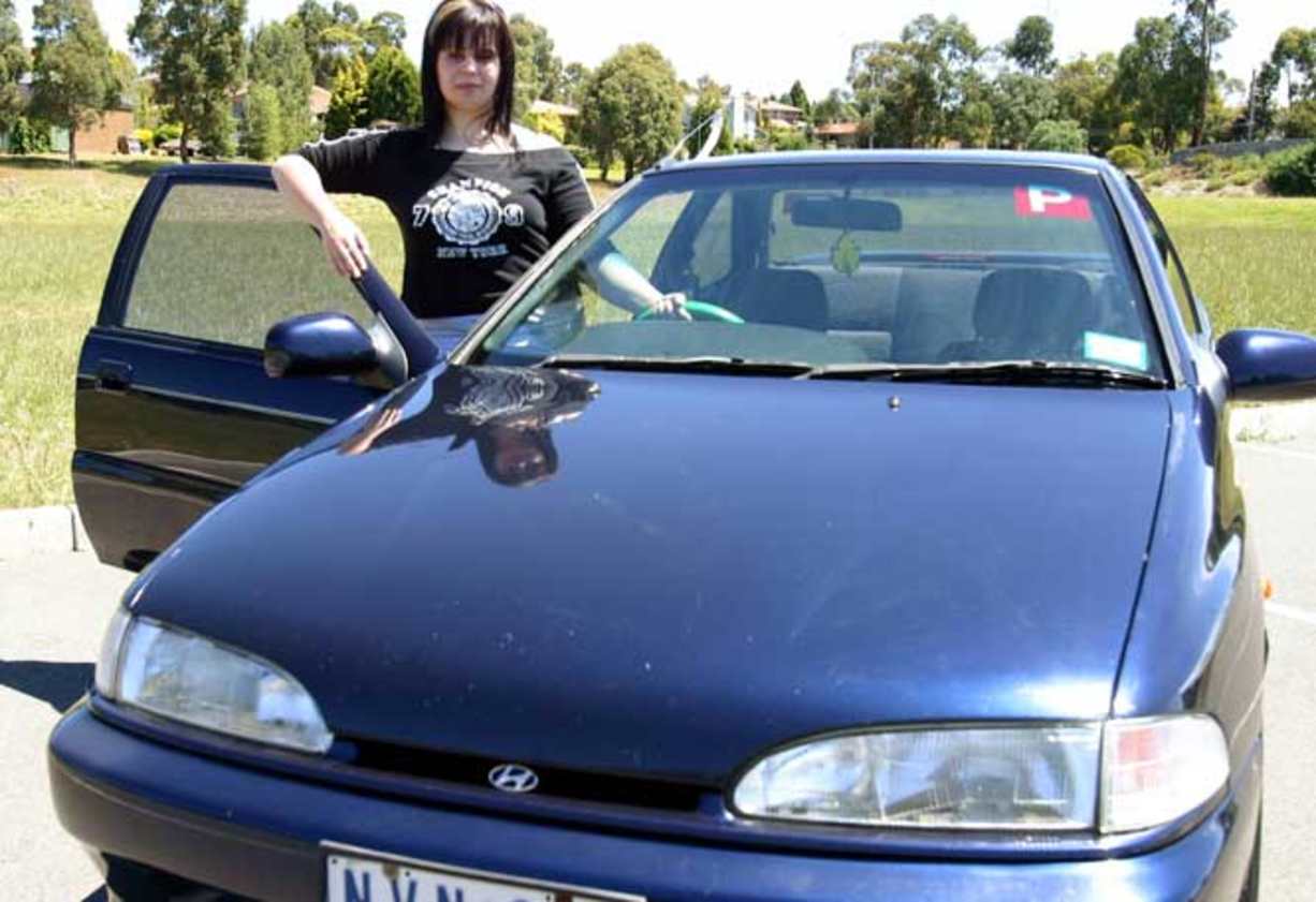 Tina Lazaridis with her 1996 Hyundai SCoupe