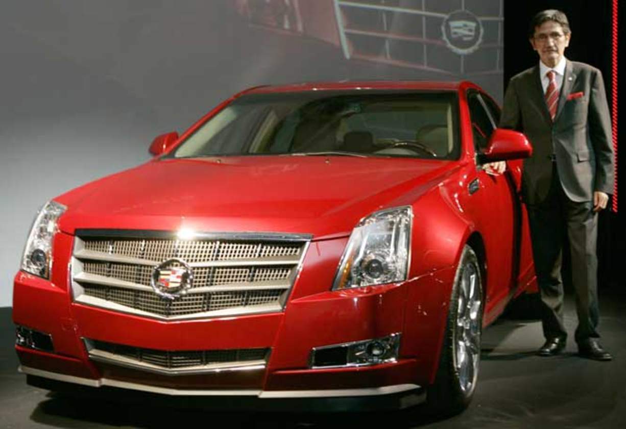 President and Representative Director of General Motors Japan, Rick Brown stands by the 2008 Cadillac CTS at the show.