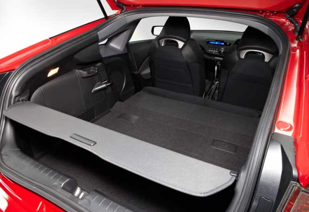 The 1.5-litre petrol engine and an electric motor combine to put out 91kW and 174Nm, the most powerful in its class, and it can take the 1160kg coupe to 100km/h in 9.7seconds. The Sport model has a six-speed manual transmission and the Luxury a CVT with p