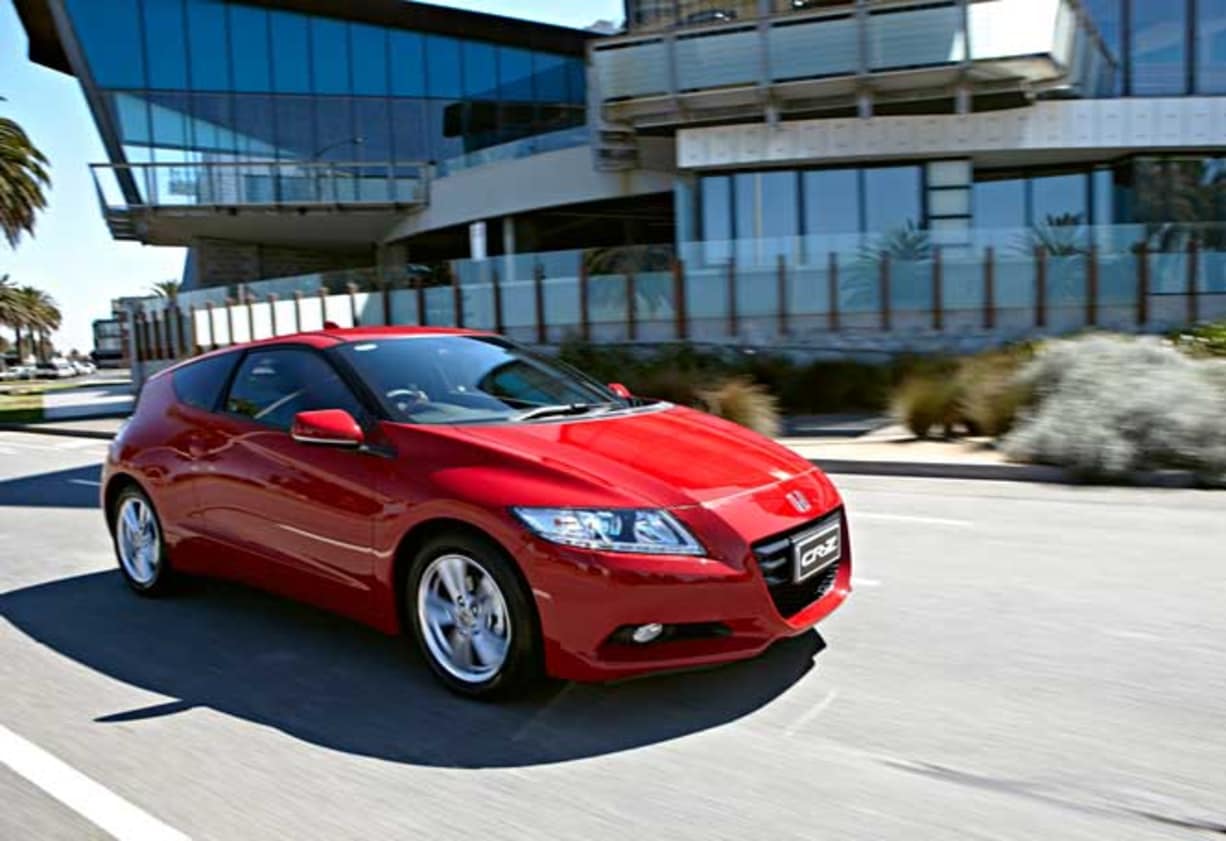 Bill Buys road tests and reviews the Honda CR-Z at its Australian launch HONDA has plugged some welcome fire into hybrid cars with the launch this week of its CR-Z......a sexy coupe described as `a fusion of sport and ecology.&#039; Clearly influenced by the d
