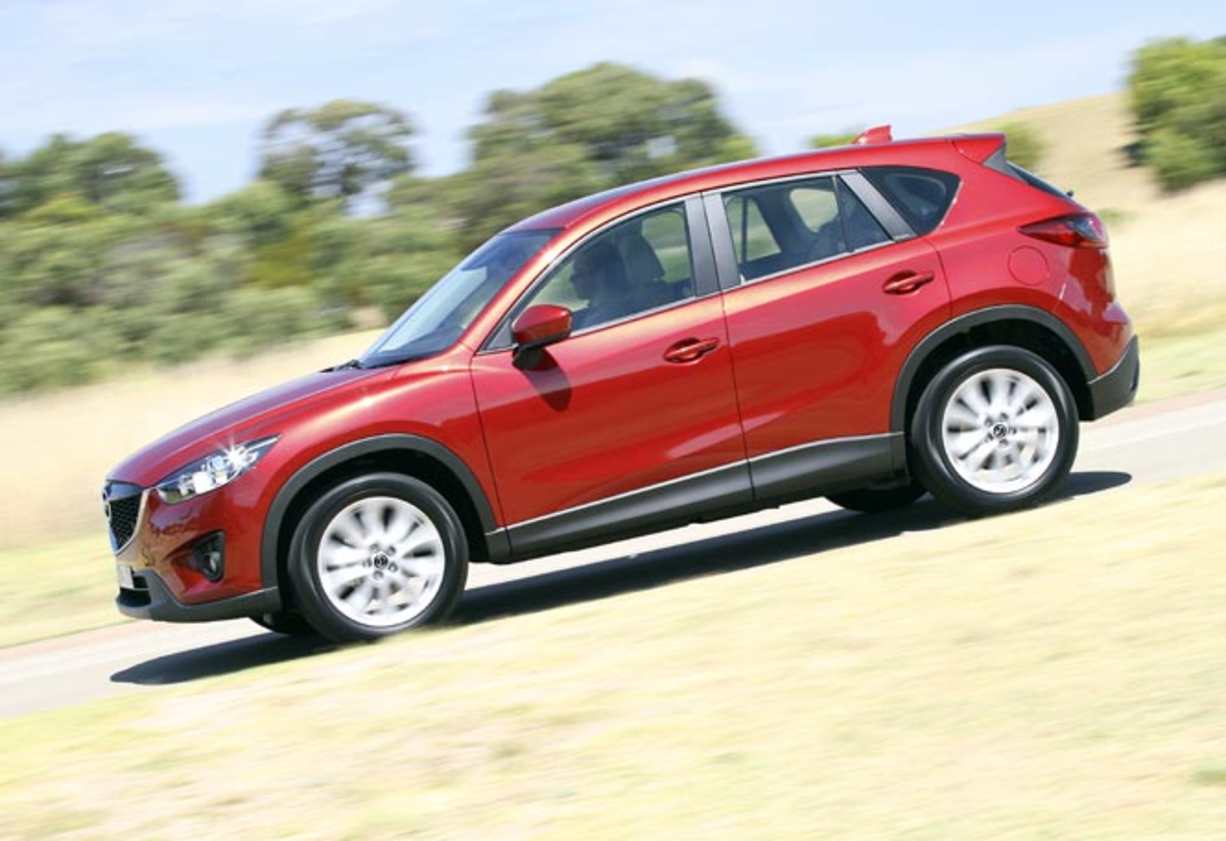 Leather upholstery is standard in the Grand Touring but the cloth of the cheaper models is actually more comfortable. Cabin room is very good and rear seats fold flat - either 60/40 or 40/20/40 dependent on model - while boot space is excellent. The spare