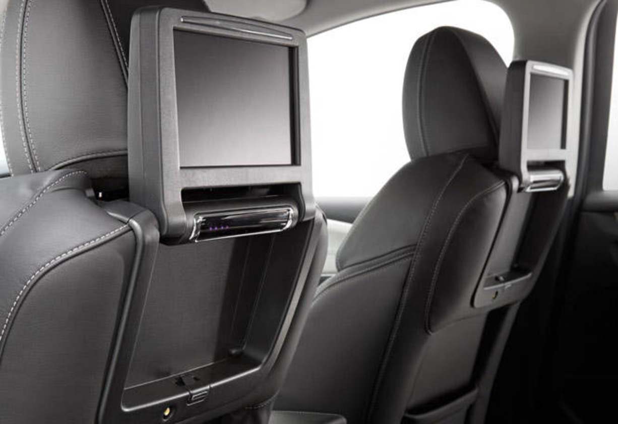 There's a rear seat entertainment setup, with remote control, DVD, AUX input and dual channel wireless headphones.