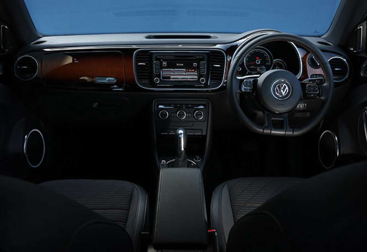 Within it&#039;s hard (for me at least) not to love the sunburst dashboard fascia just like a Fender. The flat bottomed wheel is another GTI nod, handsomely set in the brown decorative stitching that also adorns the handbrake lever, gearshift, leather surround
