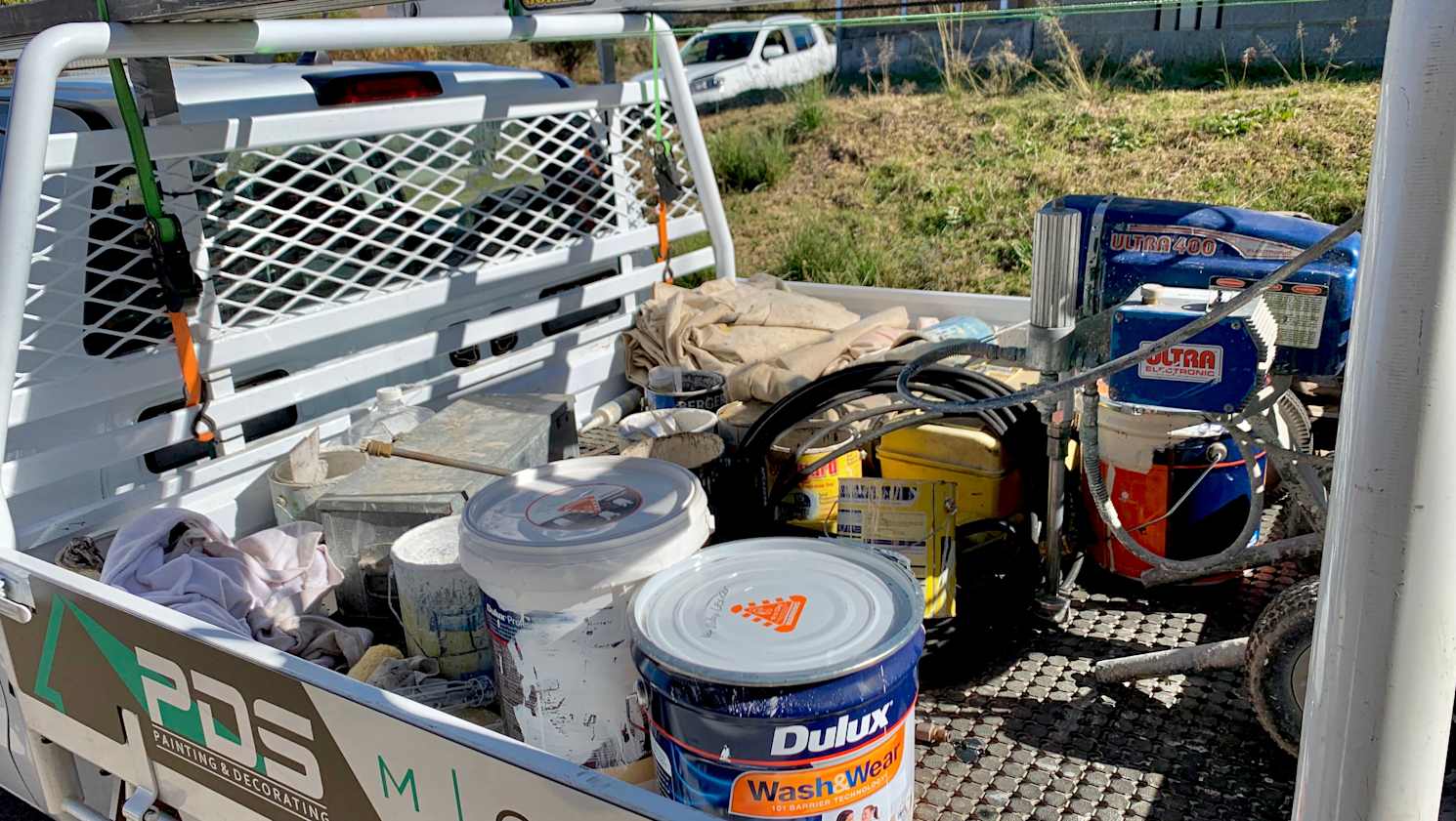 Having a large steel tray helps with the loading of all the tools and paint materials for the day.