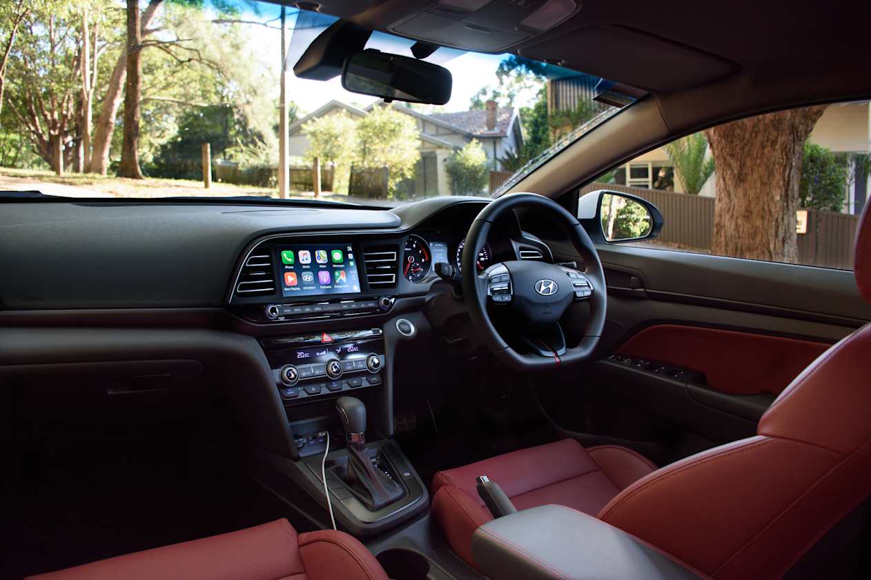 The front seats offer a nice amount of room and storage, but they're missing comfortable spots for your elbows. (image credit: Tom White)