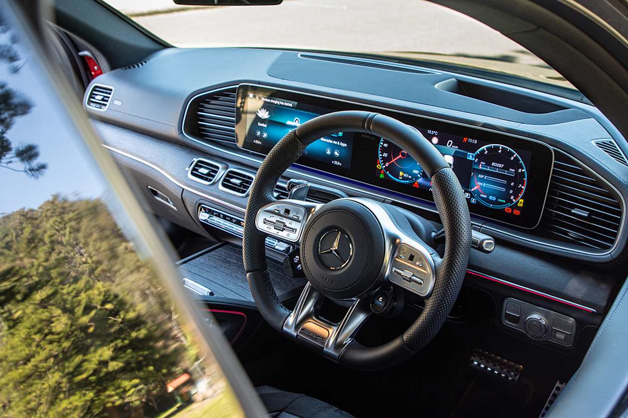 Up front you’re met with an assault of chrome, a ventilation overload and a totally dominant expanse of screens. (image: Tom White)