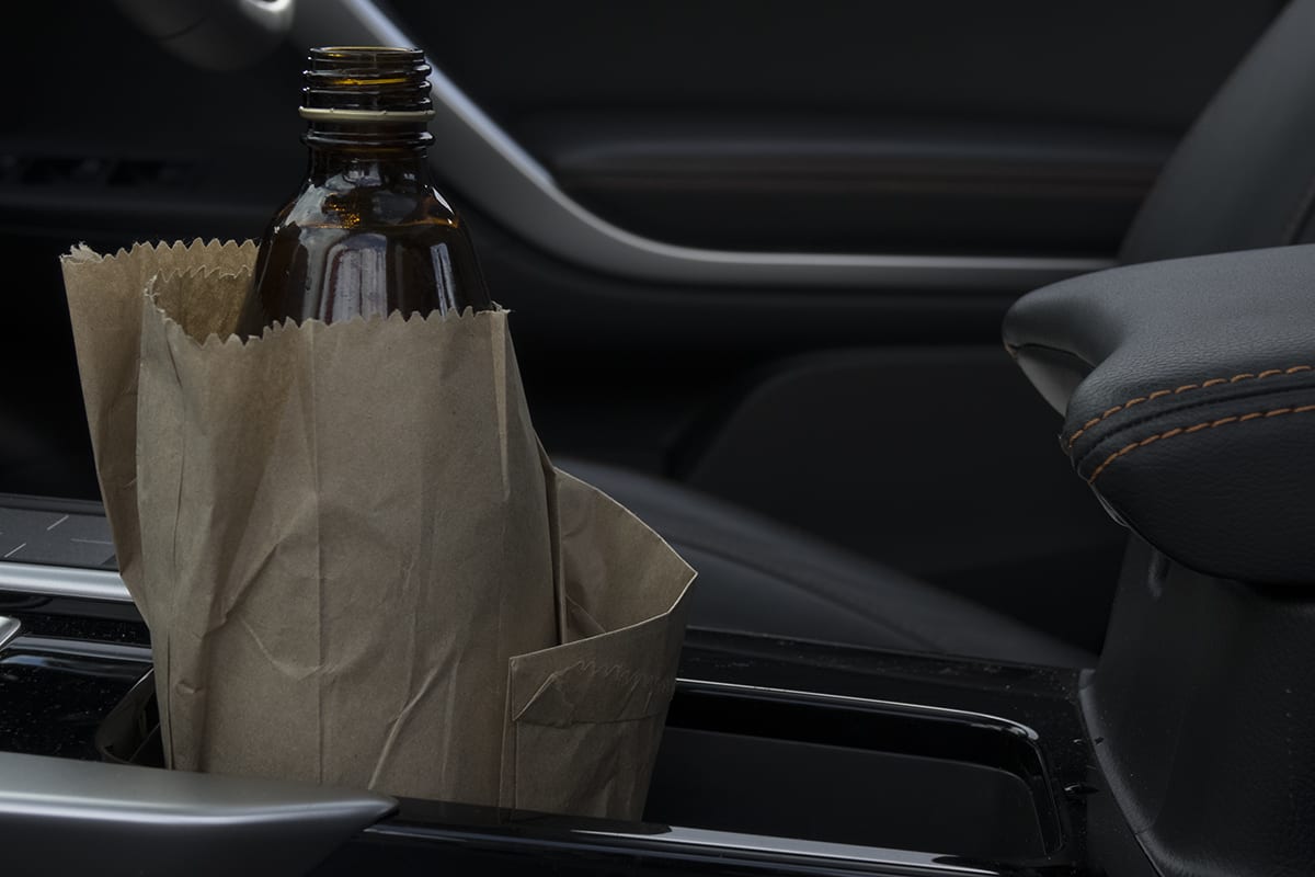 empty alcohol bottles in car