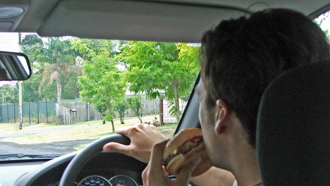 The Dangers Of Eating And Driving Comment Car Advice CarsGuide