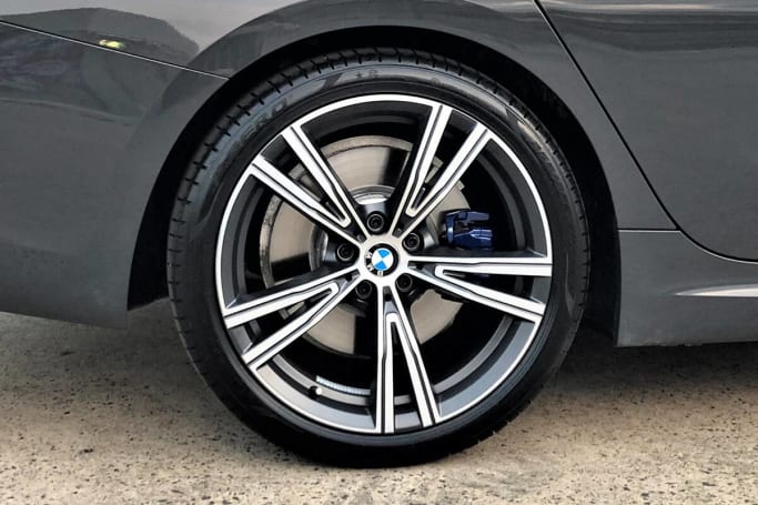 The 330i Touring wears 19-inch alloy wheels.