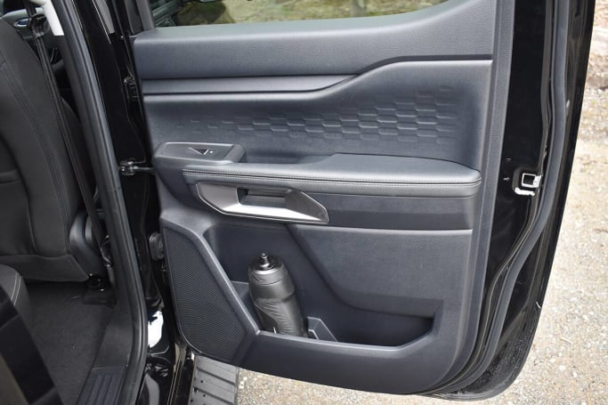 Rear seat passengers get large and small bottle holders and shorter bins at the base of each door.  (Image: Mark Ostler)