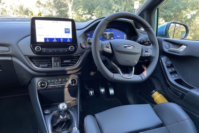 The Fiesta ST comes with a leather-wrapped heated steering wheel, an 8.0-inch touchscreen with Apple CarPlay/Android Auto, and much more. (image: Tim Nicholson)