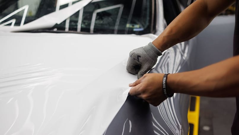 In its simplest form, car wrapping is the process of adding a flexible vinyl film to the exterior of a car. (Image: Auto Records)