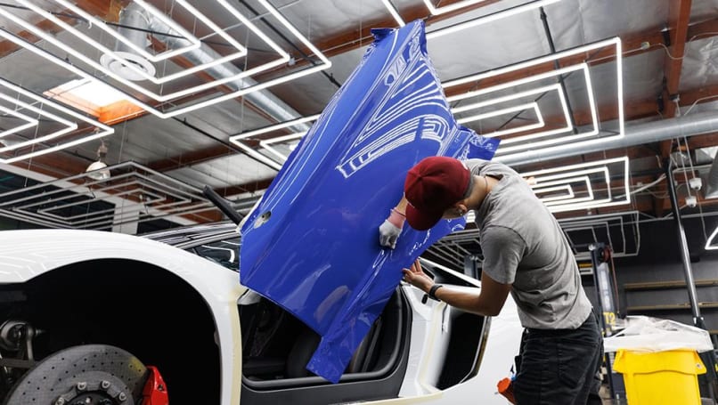 Getting the wrap to lay down properly takes skill and experience. (Image: Auto Records)
