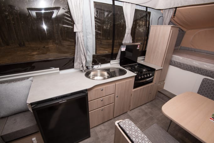 The kitchen has that distinctive Jayco touring-friendly lay-out. (image credit: Brendan Batty)