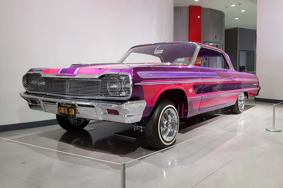 The paint scheme of "Sinful Sin", a 1964 Chevrolet Impala, extends throughout the entire car; from the chassis, wheel wells, and the custom interior. It won the "Outstanding Use of Colour Design" at the 2011 Grand National Roadster Show. (image credit: Malcolm Flynn)