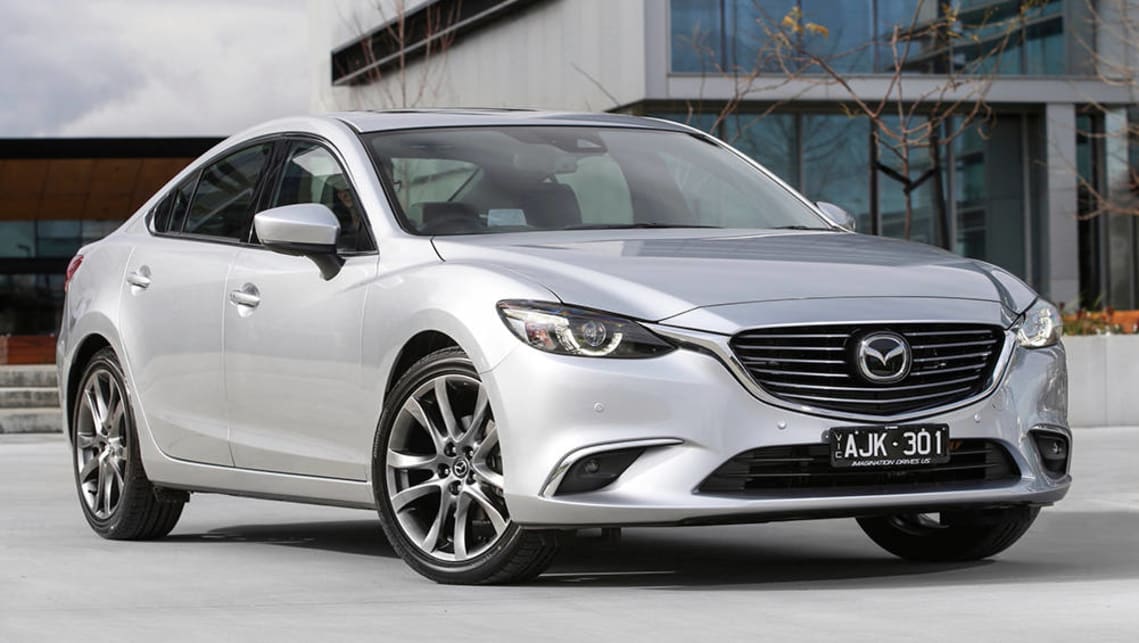 The current Mazda 6 should be able to accommodate three child seats across the back seat.
