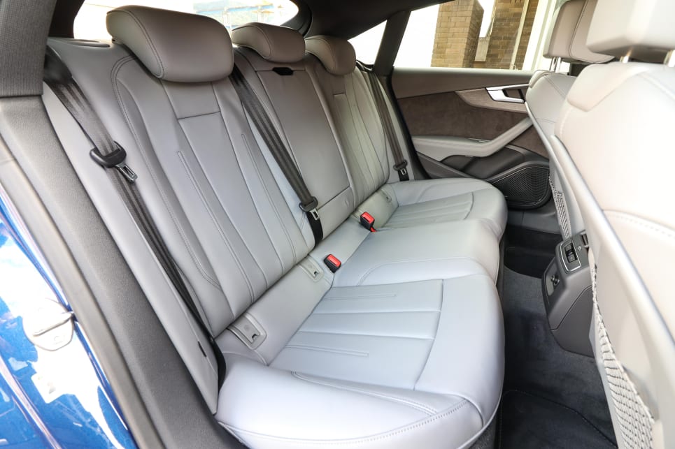 The rear seat can take three passengers, although it's best suited to take two.
