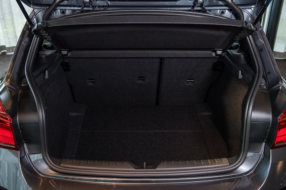 Tie-down points, shopping-bag hooks, a decent light, and small storage trays further up the practicality factor. (M140i variant pictured)