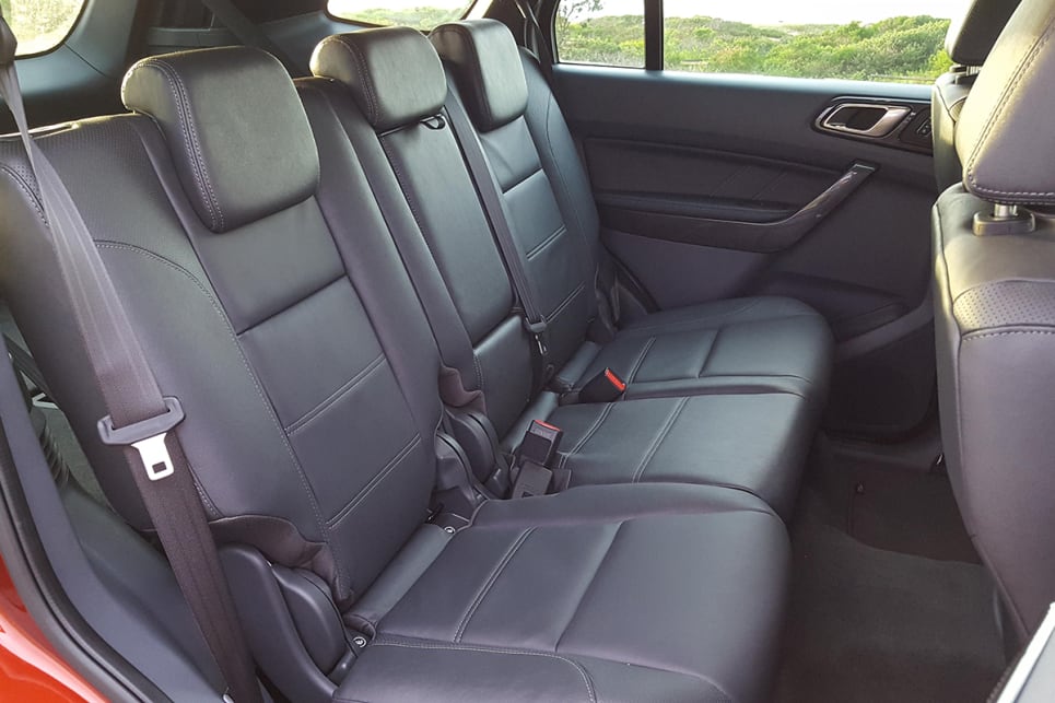 When dropping the second row of seats to make a larger cargo area, the belts can be easily caught behind the seat backs. (Image credit: Tim Robson)