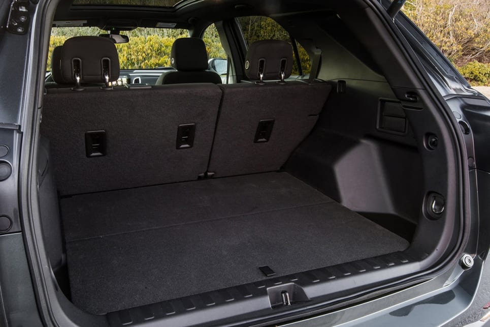 There’s a space saver spare underneath everything, but still accessible from the boot. (US Chevrolet Equinox shown here)