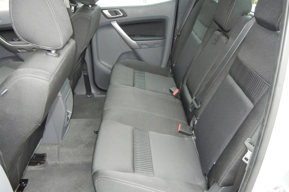 For dual cab models, rear seat occupants get two cupholders in the fold-down centre armrest. (XLT model shown)