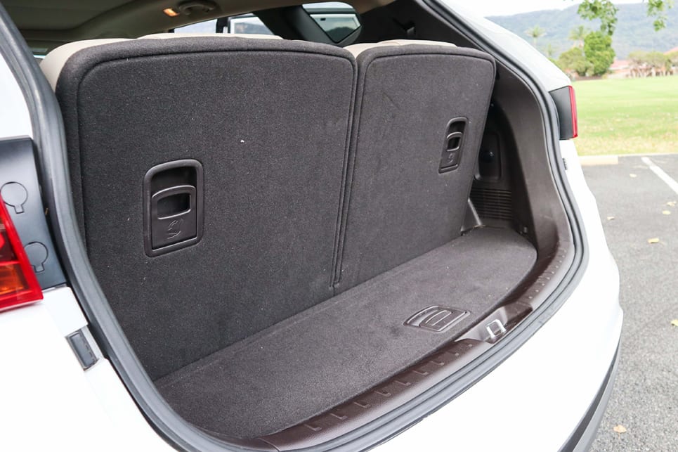 There is almost no room when the third row is up. (2018 Hyundai Santa Fe Highlander model shown)