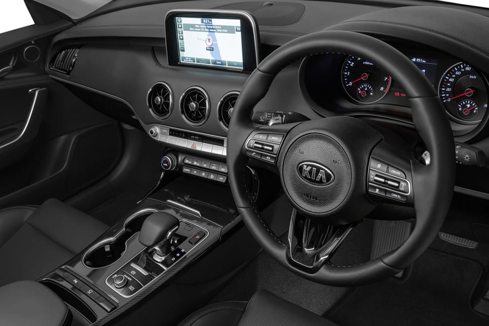  The Si versions come with real cow seats and a larger 8.0-inch multimedia screen. (2018 Kia Stinger 300Si)