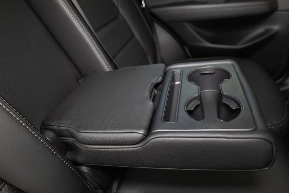 There are two cupholders in the back that will house a large keep cup, and two in the centre armrest in the back.