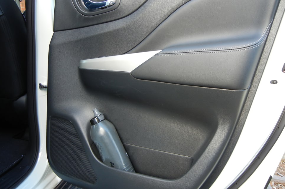 Cabin storage options include single bottle holders and storage pockets in each of the four doors.
