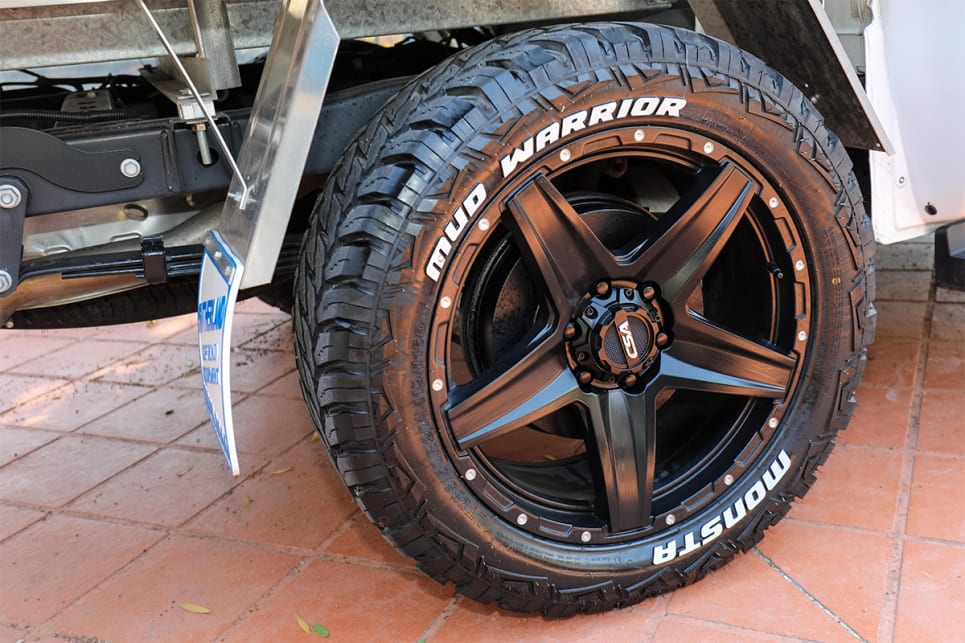 The dealership added black 20-inch wheels with mud terrain tyres on it.