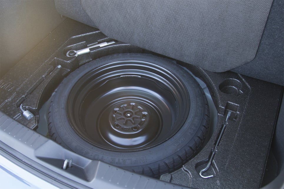 All Mazda 3s come with a space saver spare tyre. (2018 Touring model shown)