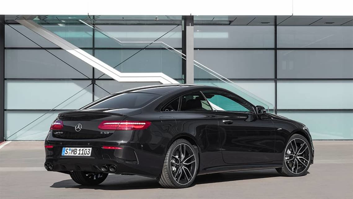 At the rear is a high-set diffuser panel and quad exhaust tailpipes finished in high-gloss (black) chrome.