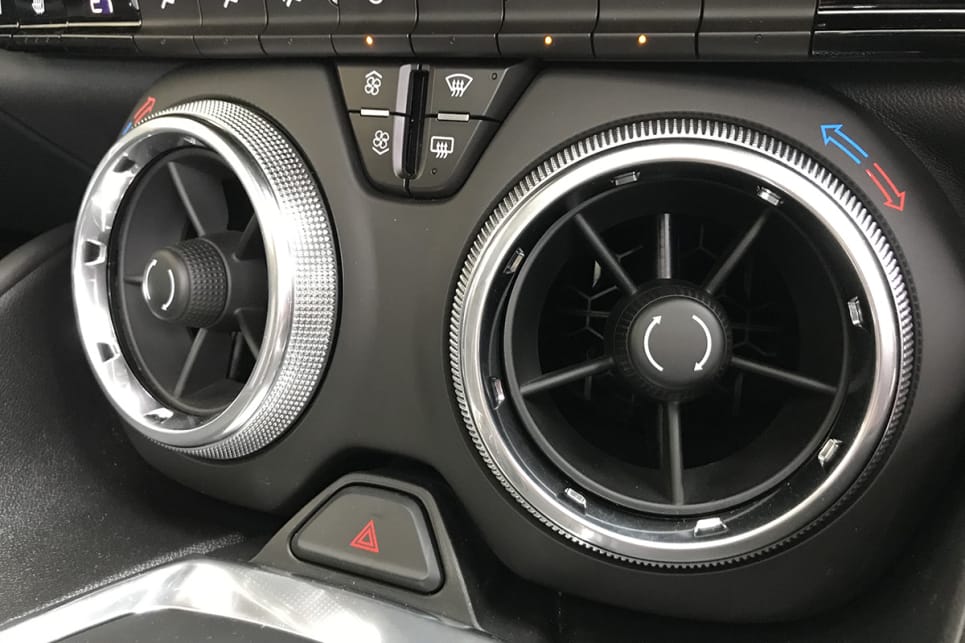 Standard equipment list includes dual-zone climate control air.