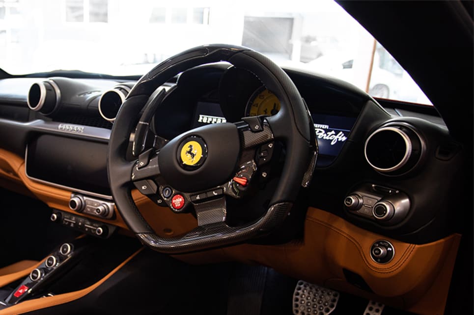 Ferrari’s Formula One-inspired wheel with the carbon fibre trim and integrated shift LEDs fitted to our car cost an extra $8300.
