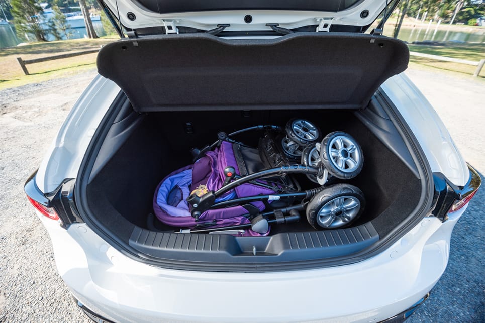 The CarsGuide pram takes up most of the space in the Mazda3's boot.