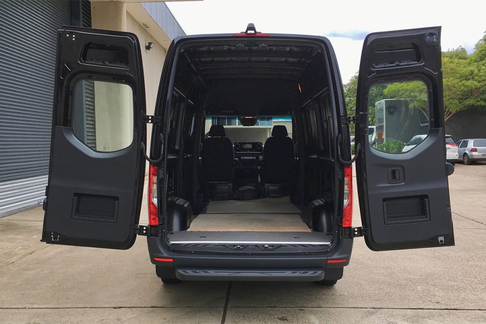 The cargo area can be accessed by a pair of rear barn doors.