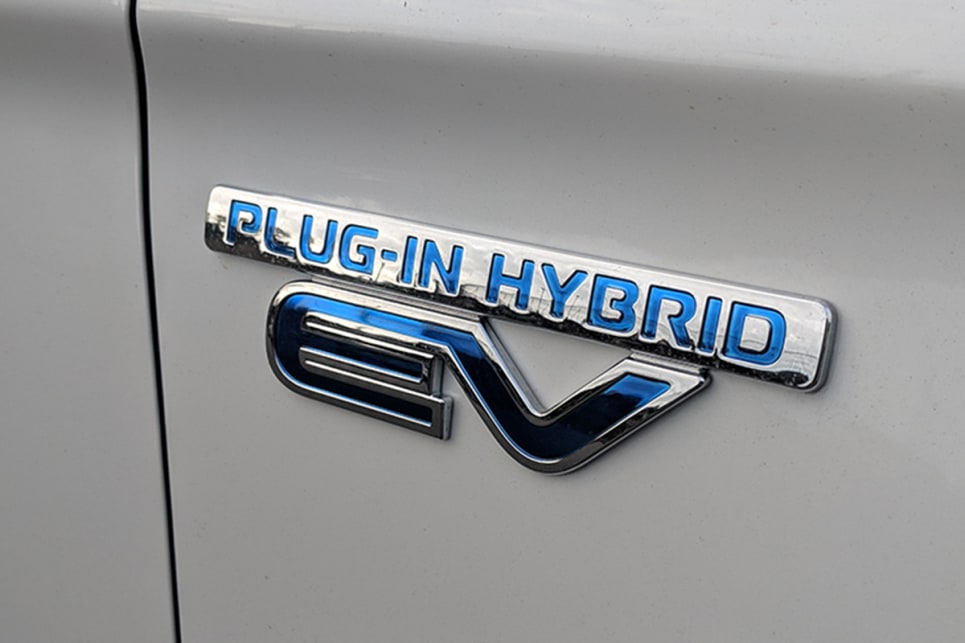 The key distinguishing feature of the PHEV is its electric blue badging.